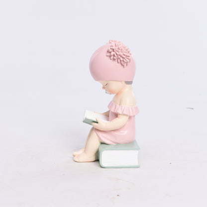 Pink baby statue, baby decoration with book, modern decoration, baby figure made of resin